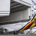 A Uganda Airlines A330-800neo sitting at the Airbus factory hangar