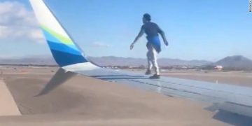 Man climbs and then falls off a Boeing 737 Aircraft Wing in Las Vegas, Nevada.